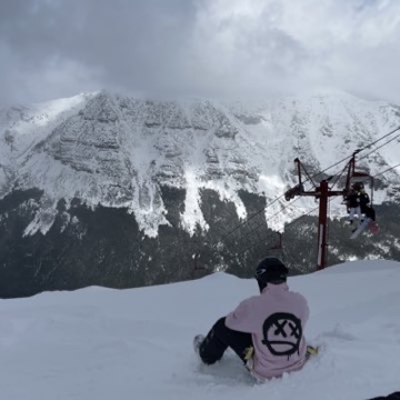 Amos Kushalu snowboarding